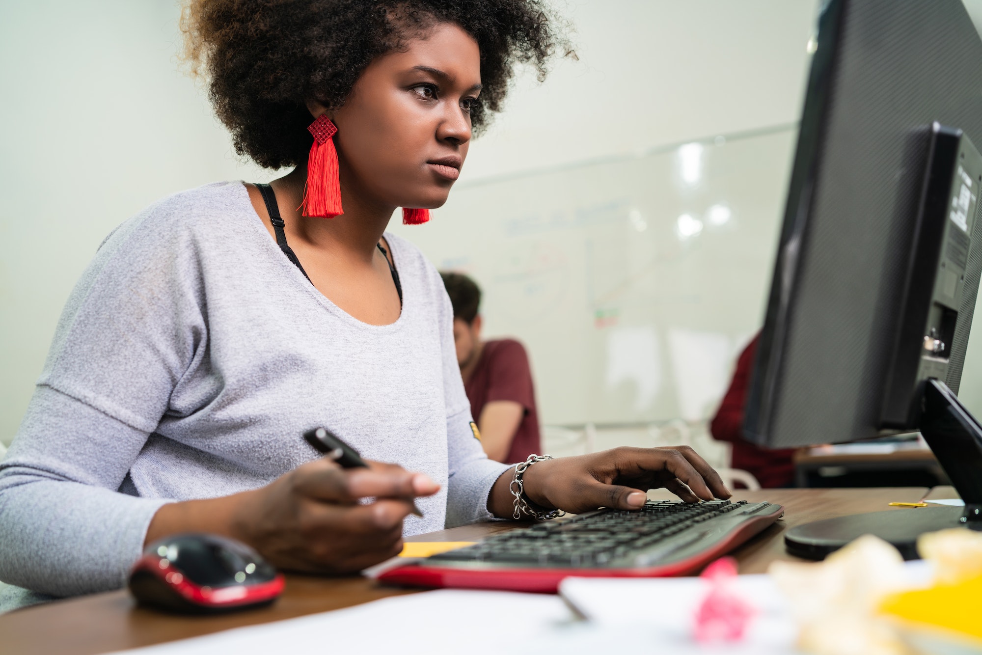 Afro american business woman working in the office.